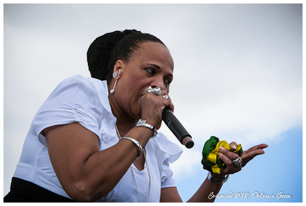 Sister Nancy, backed by iKronik